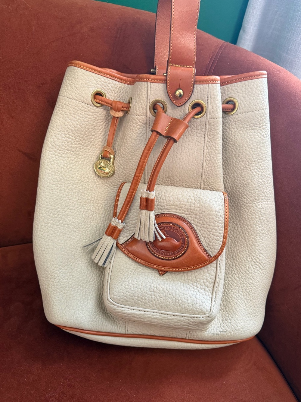 Vintage Dooney & Bourke All Weather Leather Drawstring Bucket Bag Cream Tan